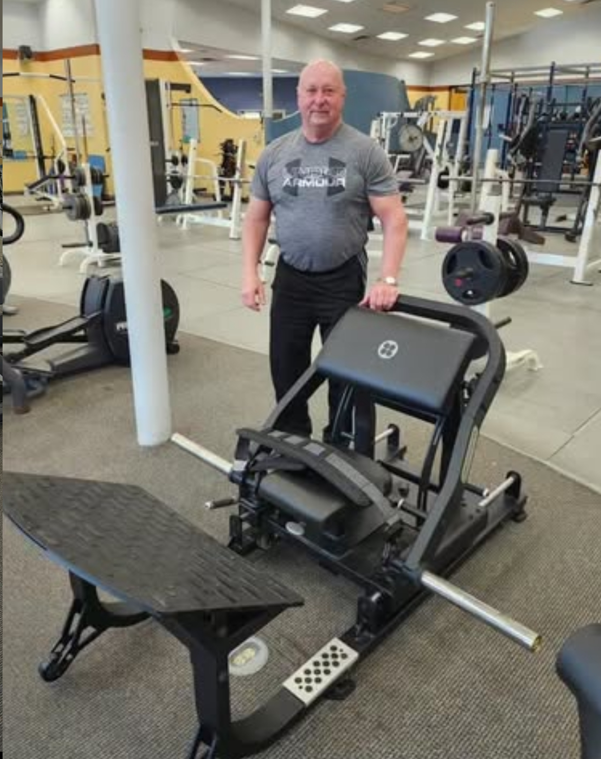 Hip Thrust vs. Squat: What Actually Builds Glutes? 1 GluteZone hip thrust machine installed at a customer gym