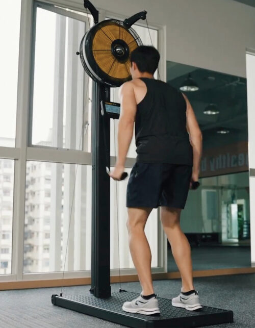 Person exercising on ski machine heavy duty, commercial grade like Hyrox Training