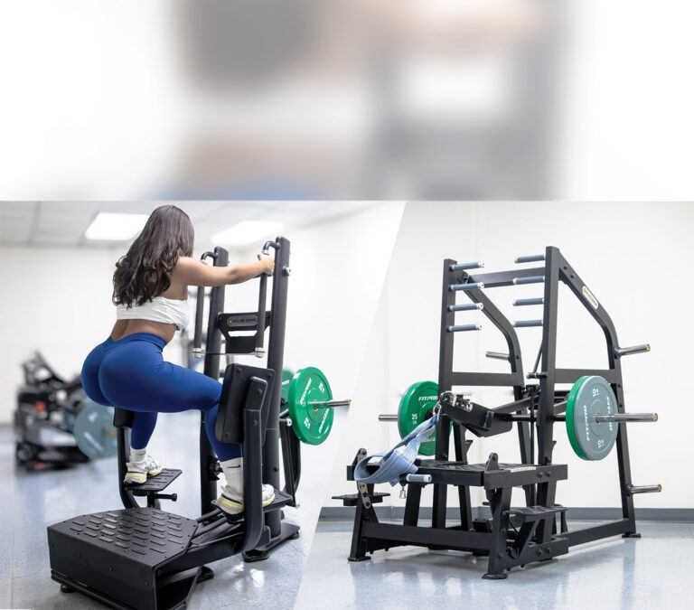 Woman training on a standing glute machine next to a plate loaded belt squat in a bright gym, part of a dedicated glute zone