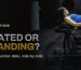 Woman training glutes on a commercial hip thrust machine in a dark gym, comparison of seated vs standing abduction